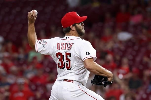 Josh Osich of the Cincinnati Reds pitches in the ninth inning against the Philadelphia Phillies at Great American Ball Park on June 28, 2021 in...
