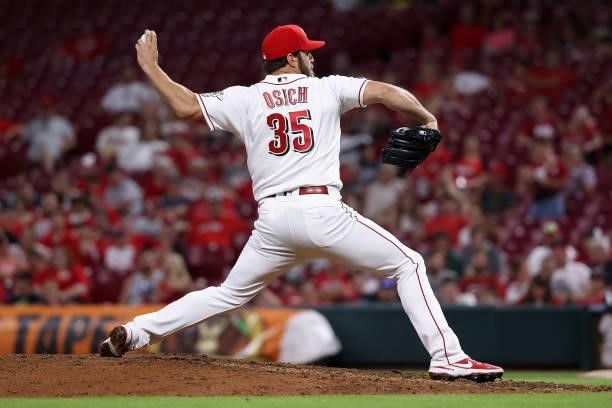 Josh Osich of the Cincinnati Reds pitches in the ninth inning against the Philadelphia Phillies at Great American Ball Park on June 28, 2021 in...