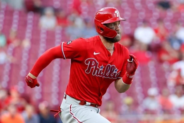Bryce Harper of the Philadelphia Phillies grounds into a fielder's choice in the first inning against the Cincinnati Reds at Great American Ball Park...