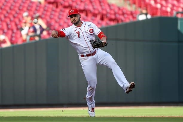 Eugenio Suarez of the Cincinnati Reds throws to first base in the second inning against the Philadelphia Phillies at Great American Ball Park on June...