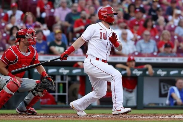 Tucker Barnhart of the Cincinnati Reds hits a single in the second inning against the Philadelphia Phillies at Great American Ball Park on June 28,...