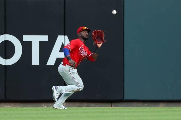 Odubel Herrera of the Philadelphia Phillies catches a fly ball in the third inning against the Cincinnati Reds at Great American Ball Park on June...