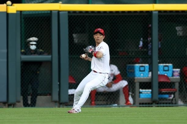 Shogo Akiyama of the Cincinnati Reds throws the ball to the infield in the fifth inning against the Philadelphia Phillies at Great American Ball Park...
