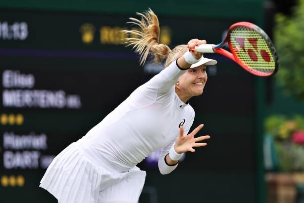 Harriet Dart of Great Britain serves in her Ladies' Singles First Round match against Elise Mertens of Belgium during Day Two of The Championships -...