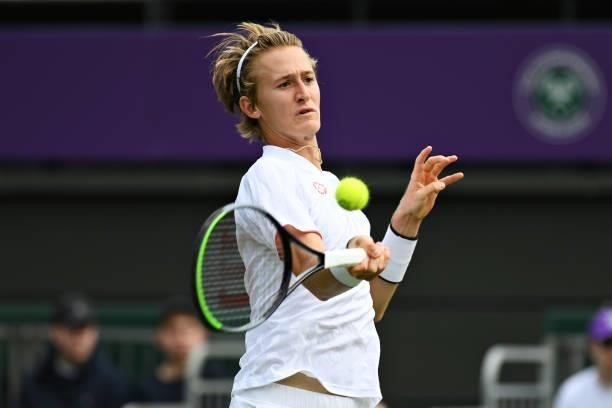 Sebastian Korda of United States plays a forehand in his Mens Singles First Round match against Alex de Minaur of Australia during Day Two of The...