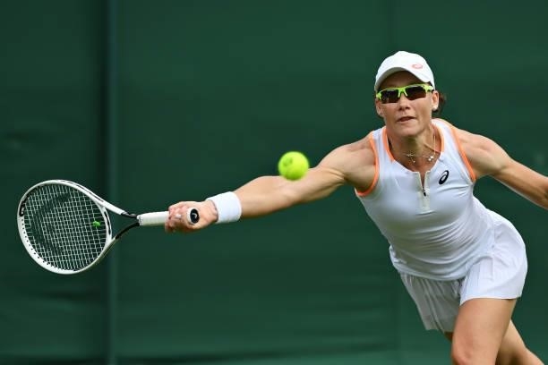 Samantha Stosur of Australia stretches to play a forehand in her Ladies' Singles First Round match against Shelby Rogers of United States during Day...