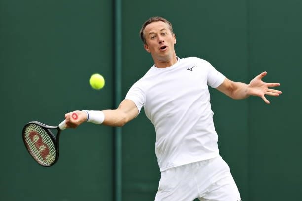 Philipp Kohlschreiber of Germany plays a forehand in his Men's Singles First Round match against Denis Shapovalov of Canada during Day Two of The...