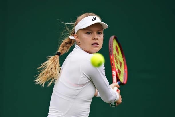 Harriet Dart of Great Britain plays a backhand in her Ladies' Singles First Round match against Elise Mertens of Belgium during Day Two of The...