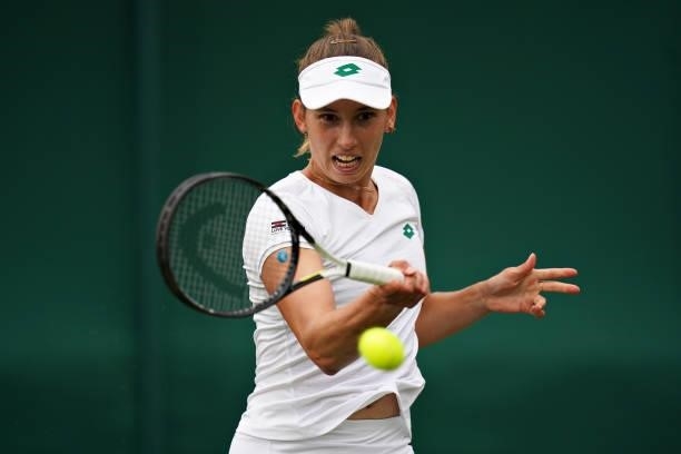 Elise Mertens of Belgium plays a forehand in her Ladies' Singles First Round match against Harriet Dart of Great Britain during Day Two of The...