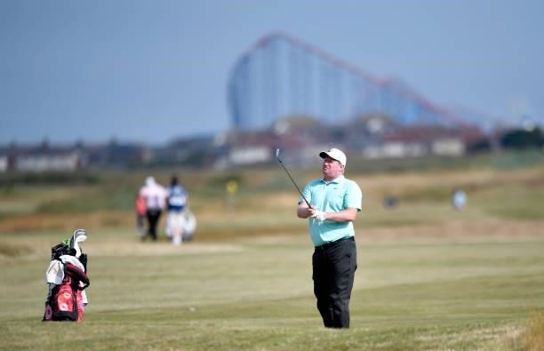 Richard Finch of England plays his second shot on the 2nd hole during Final Qualifying for the 149th Open at St Annes Old Links Golf Club on June 29,...