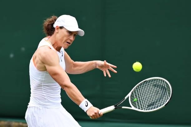 Samantha Stosur of Australia plays a backhand in her Ladies' Singles First Round match against Shelby Rogers of United States during Day Two of The...