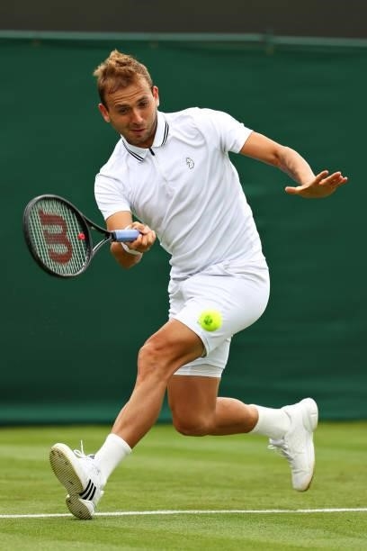 Daniel Evans of Great Britain plays a forehand in his Men's Singles First Round match against Feliciano Lopez of Spain during Day Two of The...