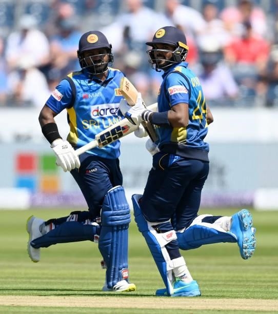 Kusal Perera and Wanindu Hasaranga of Sri Lanka run between the wickets during the 1st One Day International between England and Sri Lanka at...