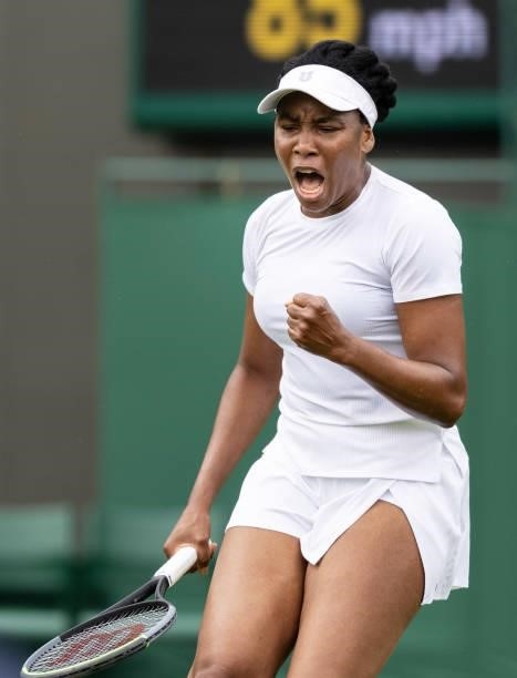 Venus Williams of United States celebrates in her Ladies' Singles First Round match against Mihaela Buzarnescu of Romania during Day Two of The...