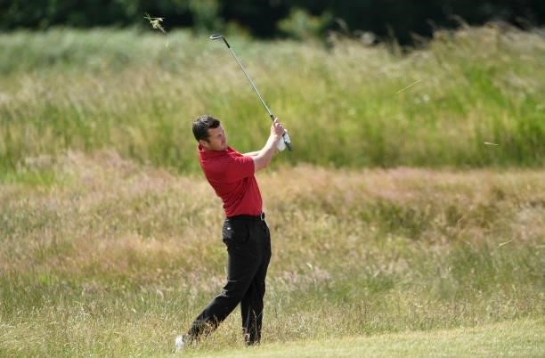Toby Hunt of Wales plays his second shot on the 10th hole during Final Qualifying for the 149th Open at St Annes Old Links Golf Club on June 29, 2021...
