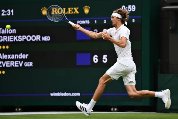Alexander Zverev of Germany plays a forehand in his Men's Singles First Round match against Tallon Griekspoor of Netherlands during Day Two of The...