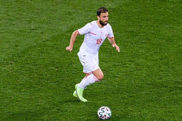 Admir Mehmedi of Switzerland runs with the ball during the UEFA Euro 2020 Championship Round of 16 match between France and Switzerland at National...