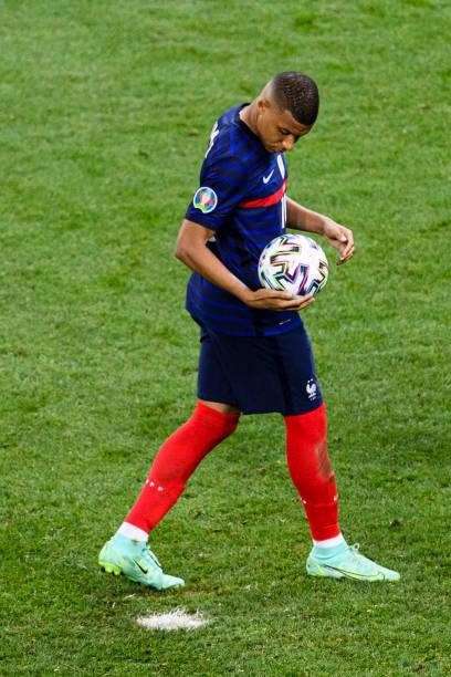 Kylian Mbappe of France attempts a free kick during the UEFA Euro 2020 Championship Round of 16 match between France and Switzerland at National...