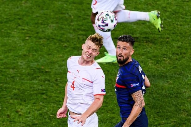 Nico Elvedi of Switzerland plays against Olivier Giroud of France during the UEFA Euro 2020 Championship Round of 16 match between France and...