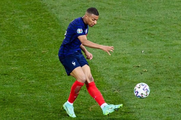 Kylian Mbappe of France passes the ball during the UEFA Euro 2020 Championship Round of 16 match between France and Switzerland at National Arena on...
