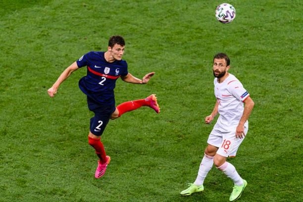 Benjamin Pavard of France heads the ball during the UEFA Euro 2020 Championship Round of 16 match between France and Switzerland at National Arena on...