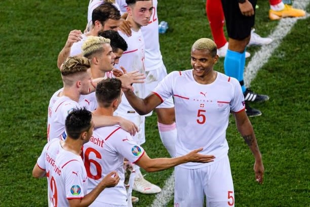 Manuel Akanji of Switzerland celebrates with his teammates after attempting a free kick for score his goal during the UEFA Euro 2020 Championship...