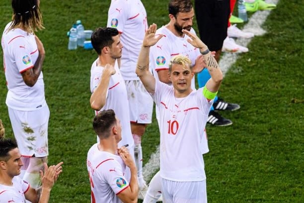 Granit Xhaka of Switzerland gestures during the UEFA Euro 2020 Championship Round of 16 match between France and Switzerland at National Arena on...