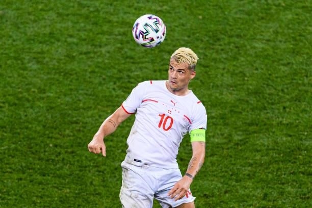 Granit Xhaka of Switzerland heads the ball during the UEFA Euro 2020 Championship Round of 16 match between France and Switzerland at National Arena...
