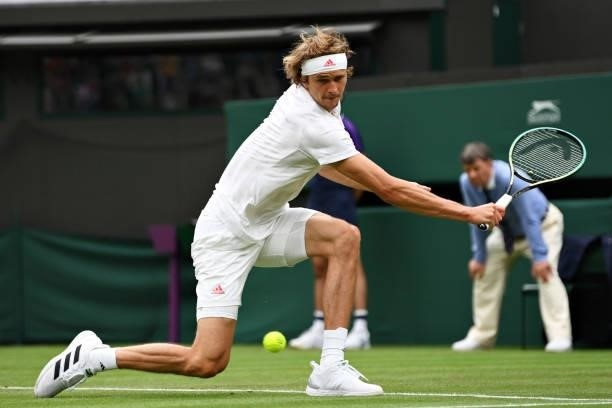 Alexander Zverev of Germany plays a backhand in his Men's Singles First Round match against Tallon Griekspoor of Netherlands during Day Two of The...