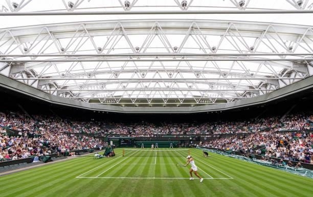 General view of Centre Court as Ashleigh Barty of Australia plays a backhand in her Ladies' Singles First Round match against Carla Suarez Navarro of...