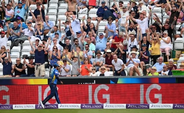 The crowd cheer after Liam Livingstone of England hits six runs during the 1st One Day International between England and Sri Lanka at Emirates...