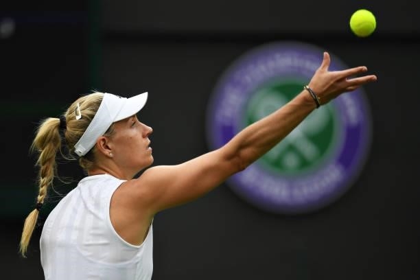 Angelique Kerber of Germany serves in her Ladies' Singles First Round match against Nina Stojanovic of Serbia during Day Two of The Championships -...