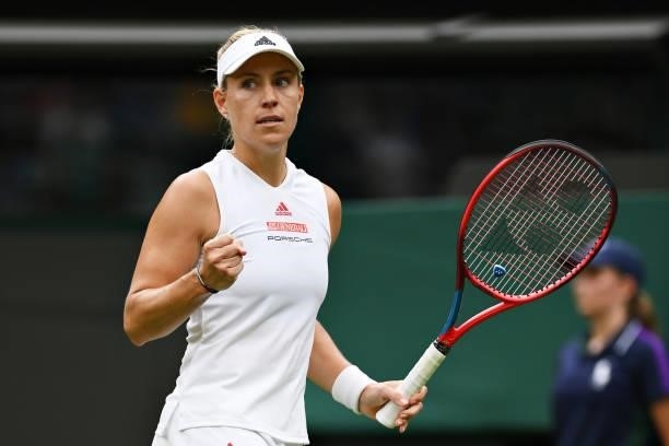 Angelique Kerber of Germany celebrates in her Ladies' Singles First Round match against Nina Stojanovic of Serbia during Day Two of The Championships...