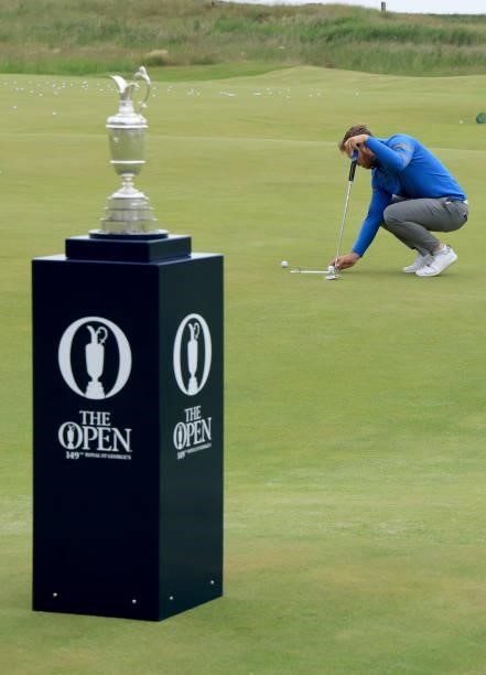 Sam Forgan of England putts on teh practice green in the shadow of the Claret Jug before his first round during Final Qualifying for the 149th Open...