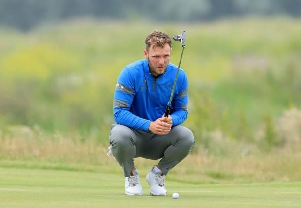 Sam Forgan of England putts on the first hole in his first round during Final Qualifying for the 149th Open at Prince's Golf Club on June 29, 2021 in...