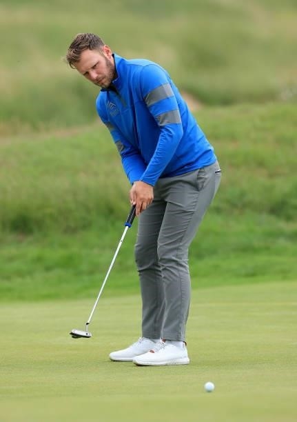 Sam Forgan of England putts on the second hole in his first round during Final Qualifying for the 149th Open at Prince's Golf Club on June 29, 2021...