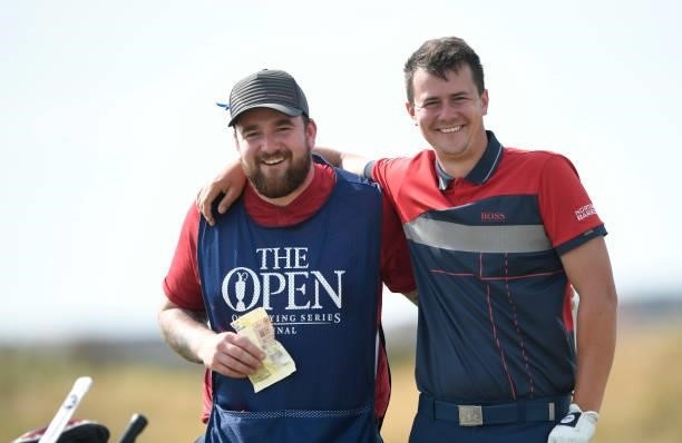 Aiden Hooson of England AM and caddy on the 7th hole during Final Qualifying for the 149th Open at St Annes Old Links Golf Club on June 29, 2021 in...