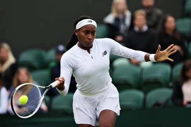 Coco Gauff of The United States plays a forehand in her Ladies' Singles First Round match against Francesca Jones of Great Britain during Day Two of...