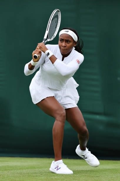 Coco Gauff of The United States plays a backhand in her Ladies' Singles First Round match against Francesca Jones of Great Britain during Day Two of...