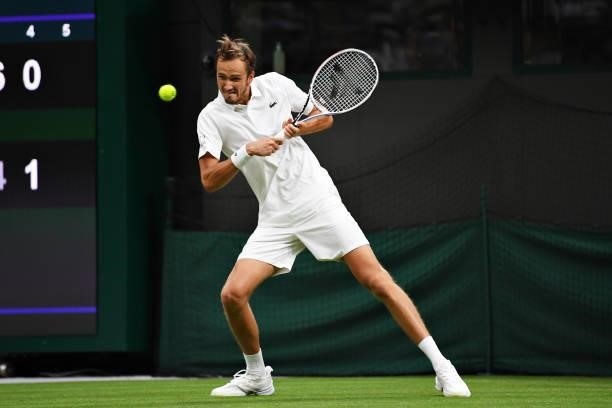 Daniil Medvedev of Russia plays a backhand in his Men's Singles First Round match against Jan-Lennard Struff of Germany during Day Two of The...