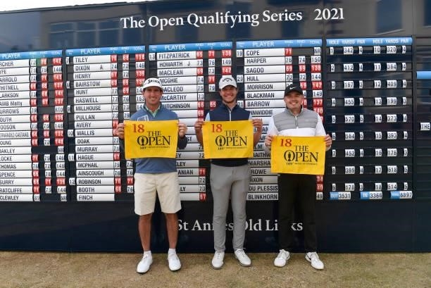 Gonzalo Fernández-Castaño of Spain, Ben Hutchinson of England and Sam Bairstow of England poses with The Open flag after qualifying for the 149th...