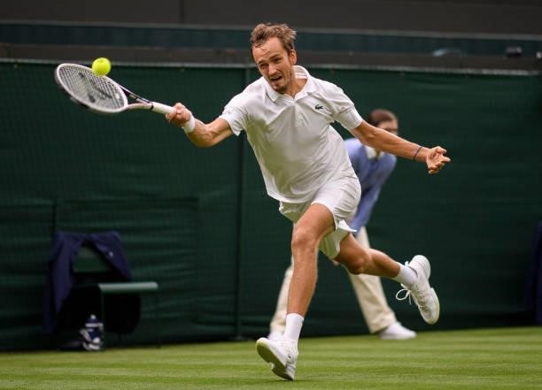 Daniil Medvedev of Russia plays a forehand in his Men's Singles First Round match against Jan-Lennard Struff of Germany during Day Two of The...