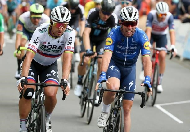Winner Mark Cavendish of Great Britain and Deceuninck - Quick Step, Peter Sagan of Slovakia and Team Bora-Hansgrohe during stage 4 of the 108th Tour...