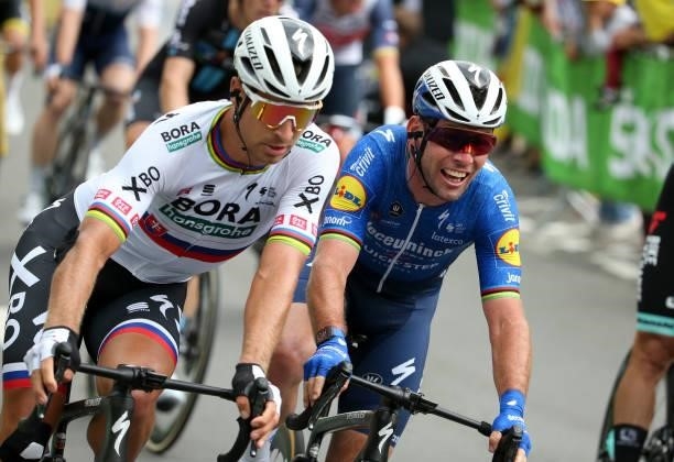 Winner Mark Cavendish of Great Britain and Deceuninck - Quick Step, Peter Sagan of Slovakia and Team Bora-Hansgrohe during stage 4 of the 108th Tour...