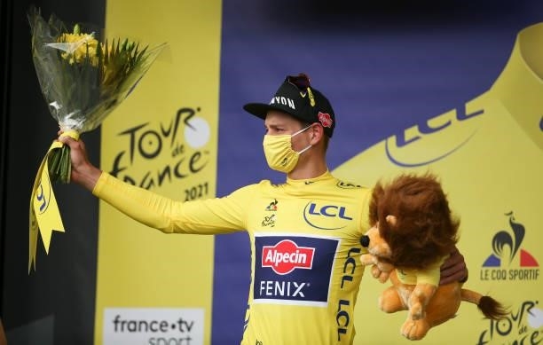 Mathieu Van Der Poel of Netherlands and Alpecin - Fenix retains the yellow jersey of race's leader during the podium ceremony of stage 4 of the 108th...
