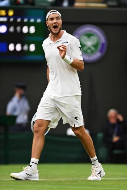 Jan-Lennard Struff of Germany reacts after a missed point in his Men's Singles First Round match against Daniil Medvedev of Russia during Day Two of...