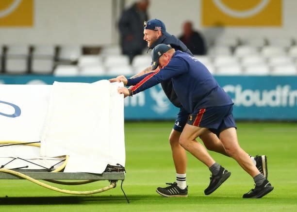 Groundsmen push on the rain covers at the interval during the Vitality T20 Blast match between Essex Eagles and Somerset CCC at Cloudfm County Ground...