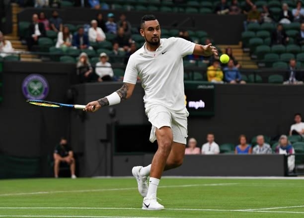Nick Kyrgios of Australia plays a forehand in his Men's Singles First Round match against Ugo Humbert of France during Day Two of The Championships -...
