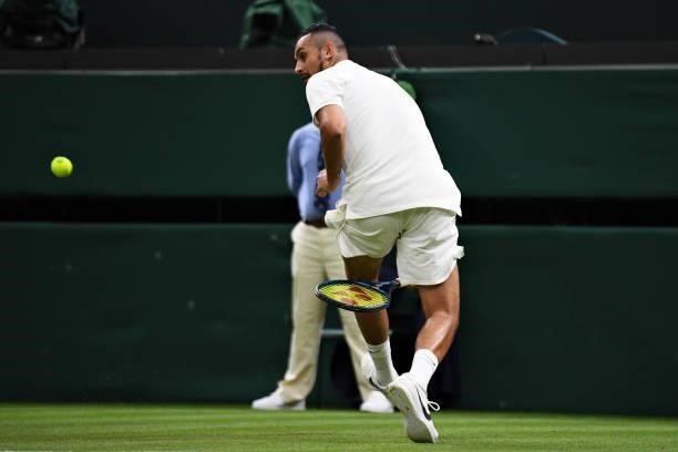 Nick Kyrgios of Australia plays a shot through his legs in his Men's Singles First Round match against Ugo Humbert of France during Day Two of The...
