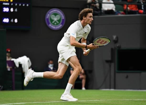 Ugo Humbert of France in action in his Men's Singles First Round match against Nick Kyrgios of Australia during Day Two of The Championships -...